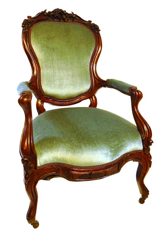 Appraisal: th C Victorian gentleman's chair rosewood faded mint-colored velvet upholstery