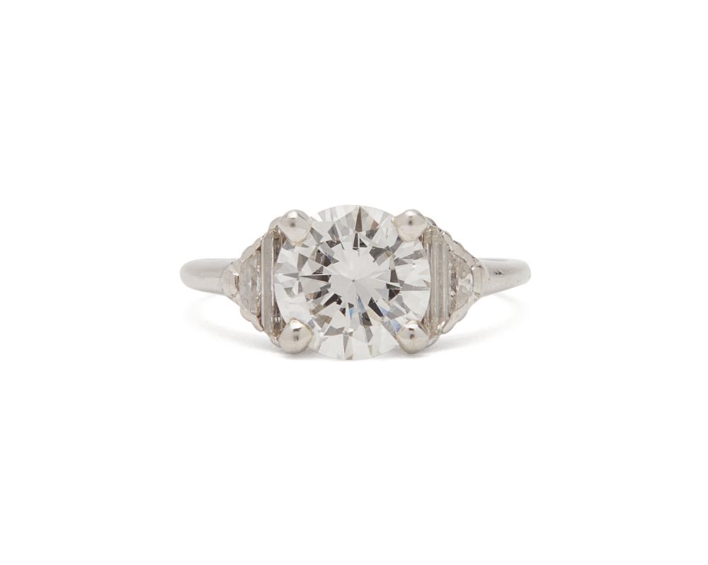 Appraisal: Platinum and Diamond Ring centering a round brilliant-cut diamond weighing