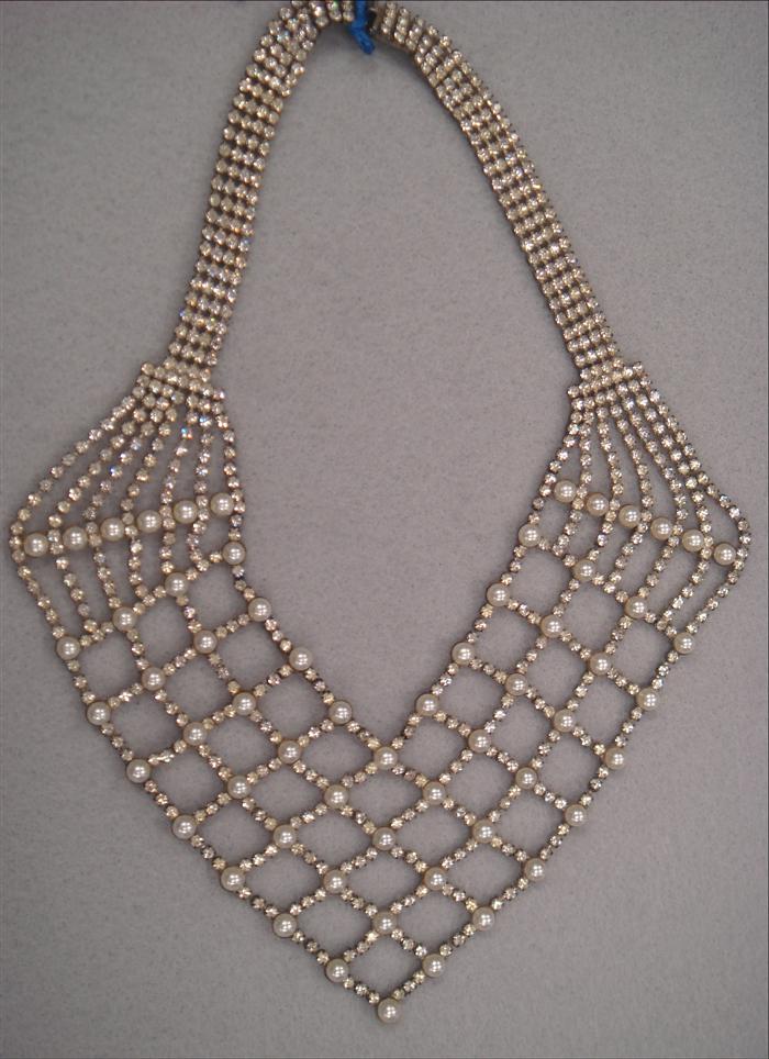 Appraisal: Vintage web design bib with rhinestones and faux pearls Estimate