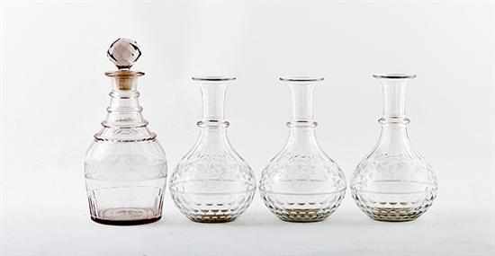 Appraisal: British cut and etched glass decanters th century etched and