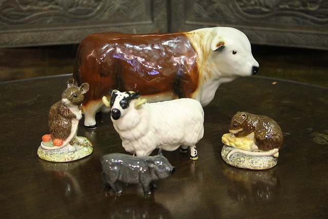 Appraisal: A SMALL COLLECTION OF FIVE CERAMIC ANIMALS including a Beswick