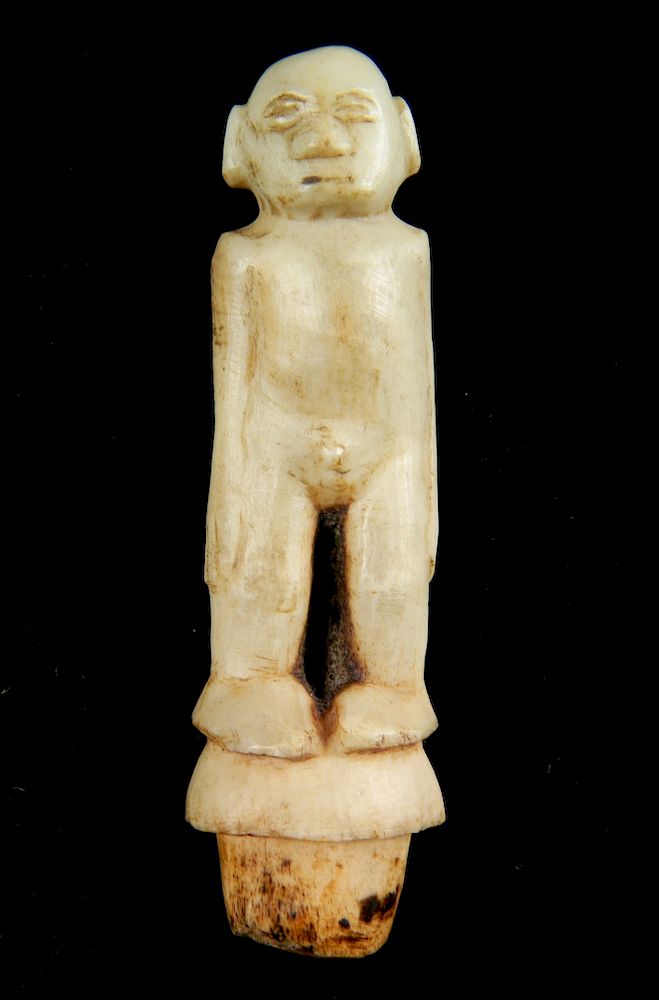 Appraisal: Thule bone carving Thule bone carving of a male figure