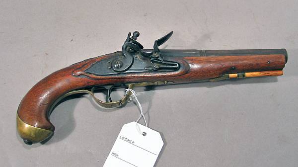 Appraisal: A brass-mounted continental flintlock pistolcirca The inch two-stage barrel in