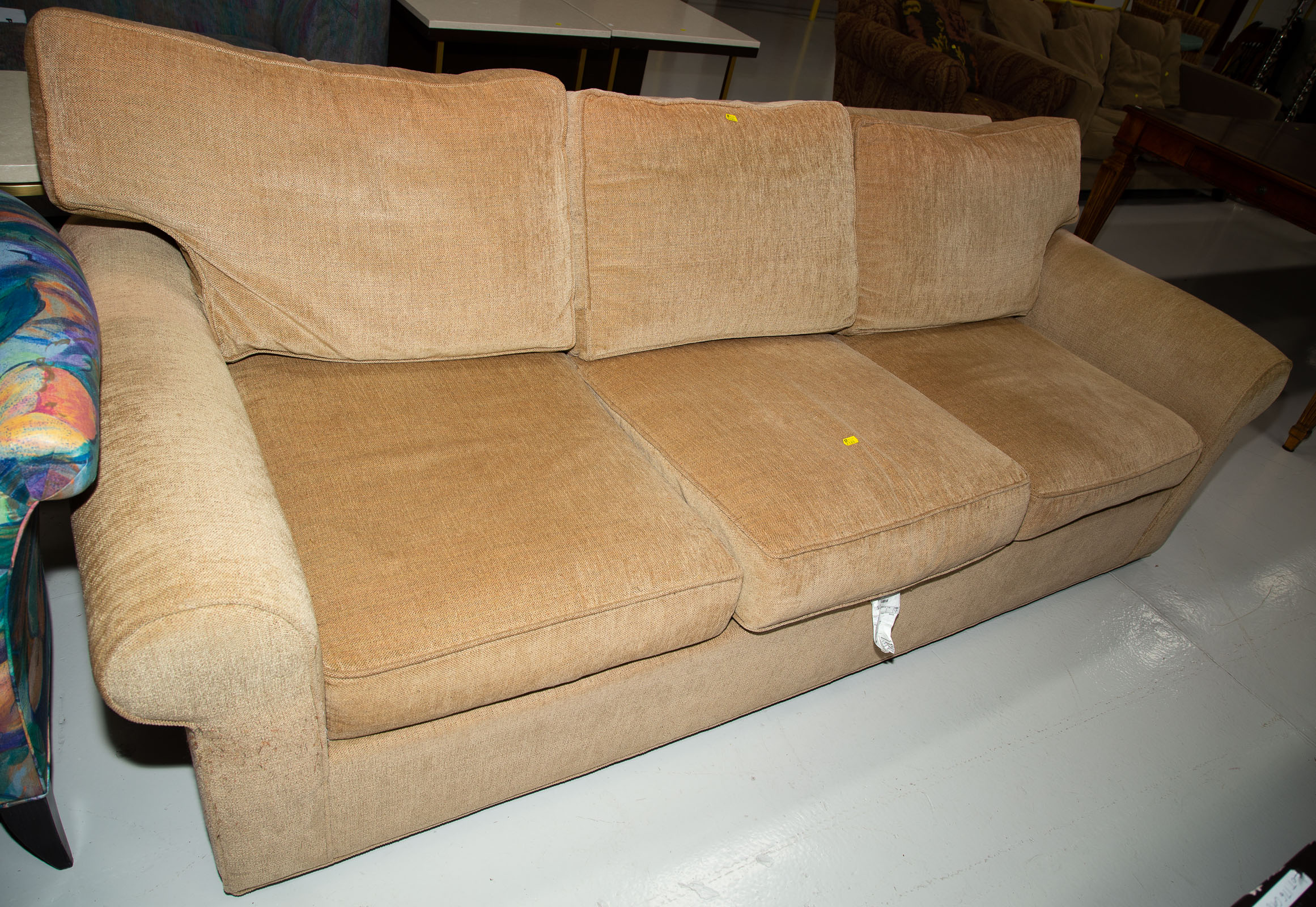 Appraisal: AN ETHAN ALLEN UPHOLSTERED SOFA With four throw pillows approximately