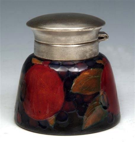 Appraisal: A MOORCROFT POMEGRANATE INKWELL with silver plated top impressed 'Moorcroft