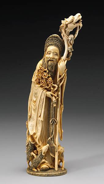 Appraisal: A tinted ivory carving of an immortal Late th Century