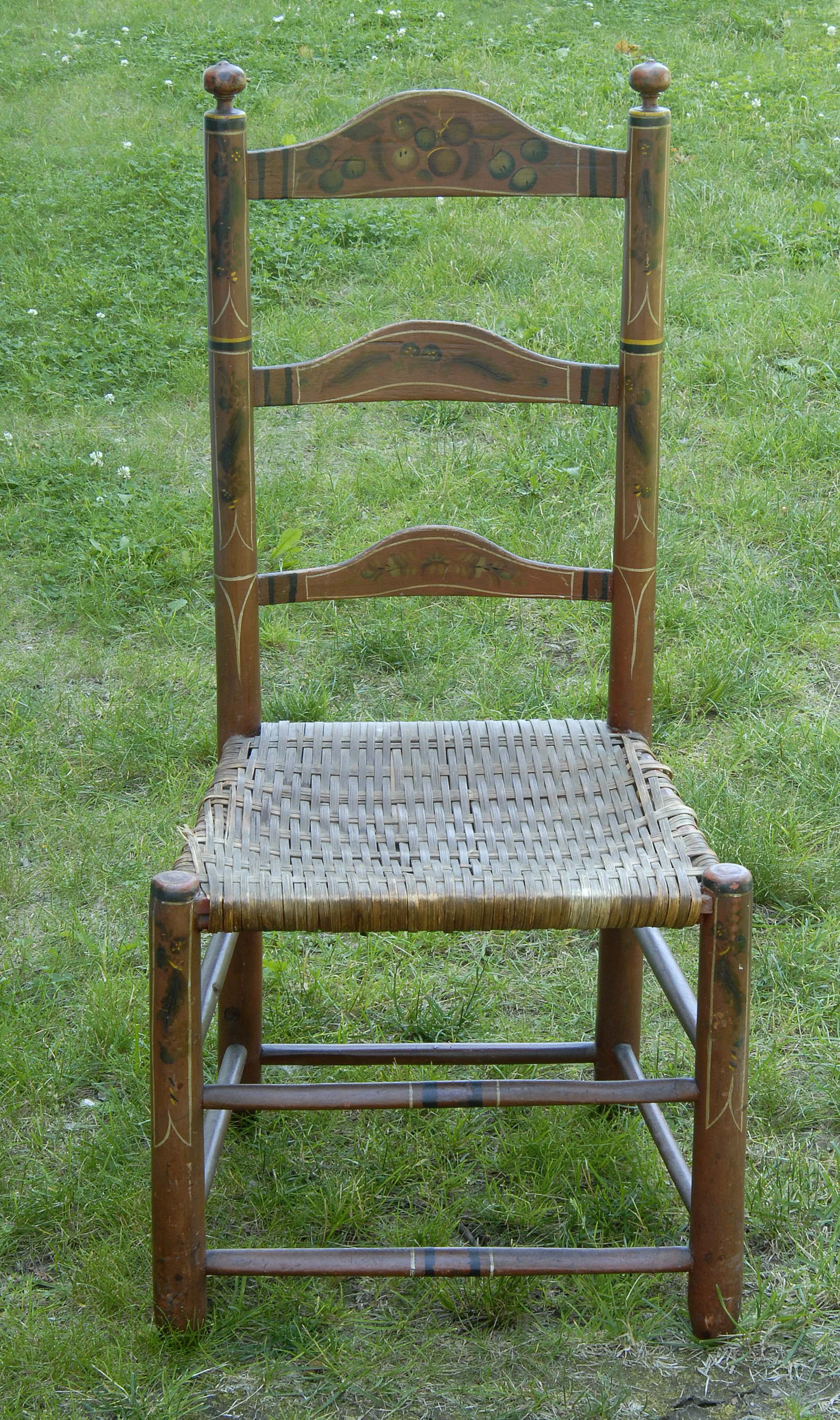 Appraisal: TH CENTURY AMERICAN LADDER-BACK SIDE CHAIR with fruit and flower