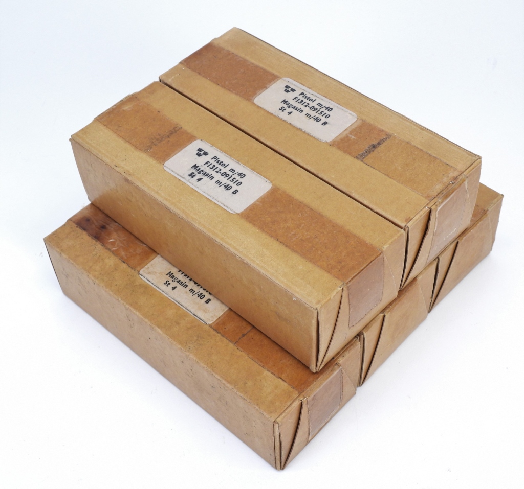 Appraisal: UNISSUED SWEDISH LAHTI M MAGAZINES Sweden Five waxed cardboard boxes