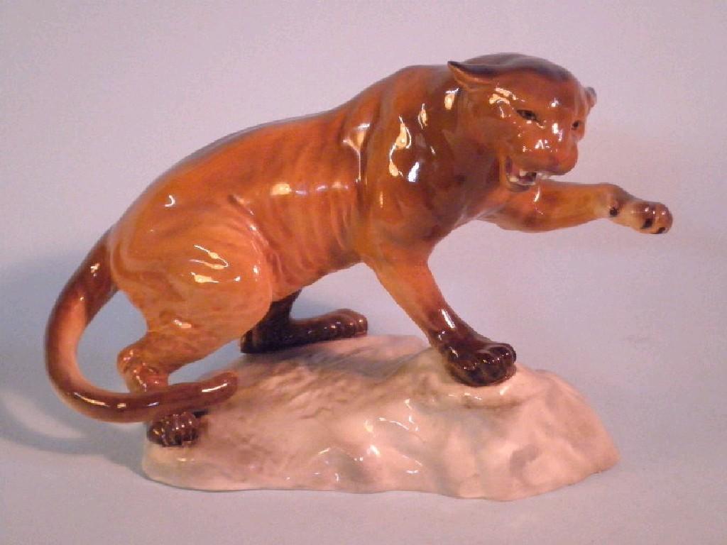 Appraisal: Beswick A puma on a rock