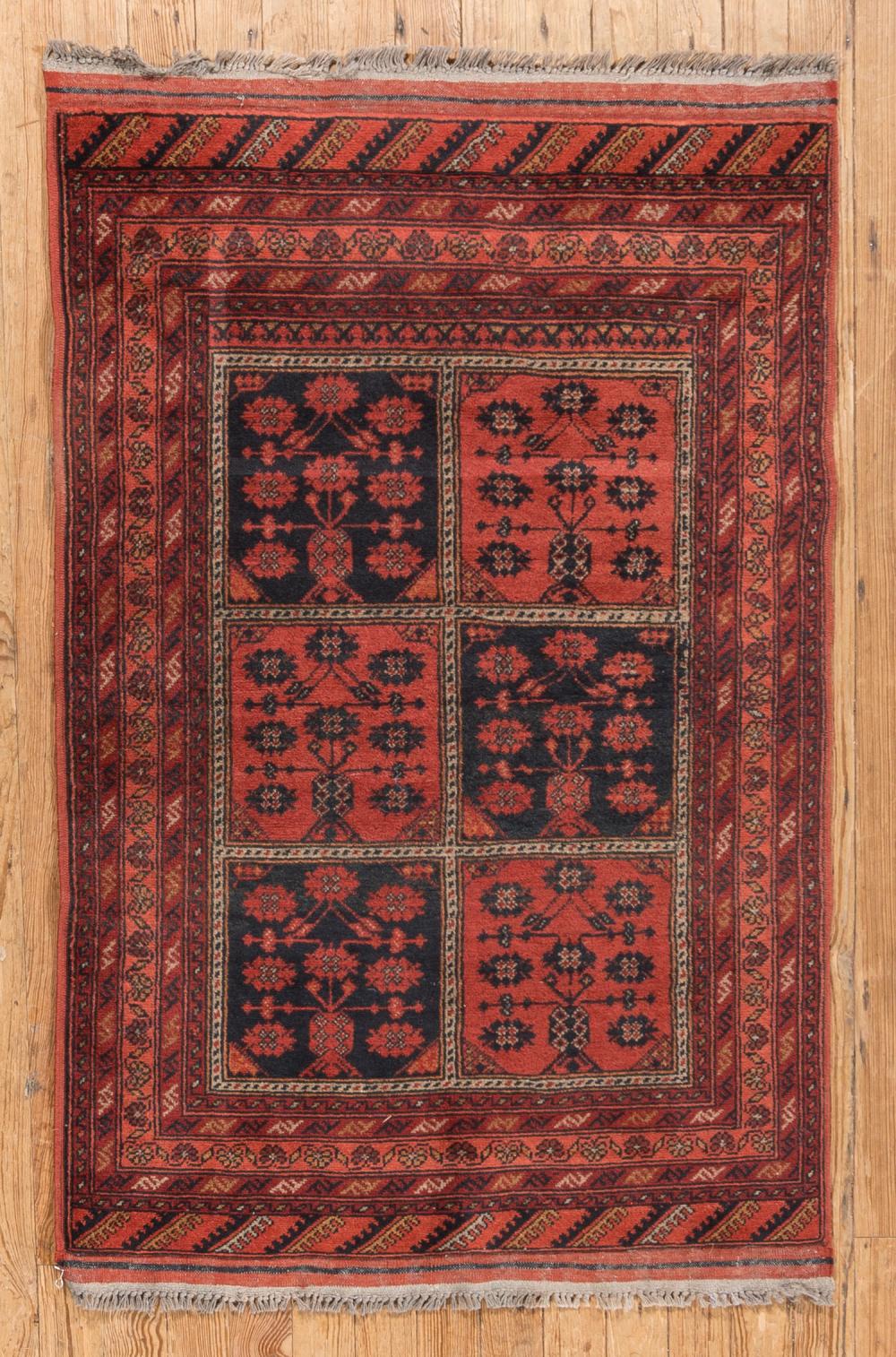 Appraisal: Small Turkmen Rug red ground panel design allover rosette motifs