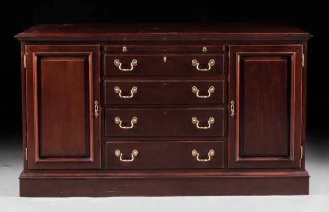 Appraisal: Chippendale style mahogany credenza Link Taylor th century brushing slide