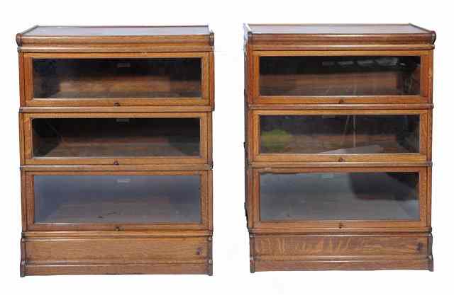 Appraisal: A PAIR OF THREE SECTION GLOBE WERNICKE OAK BOOKCASES each