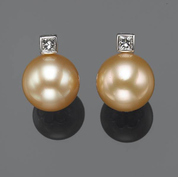 Appraisal: A pair of golden South Sea cultured pearl diamond and