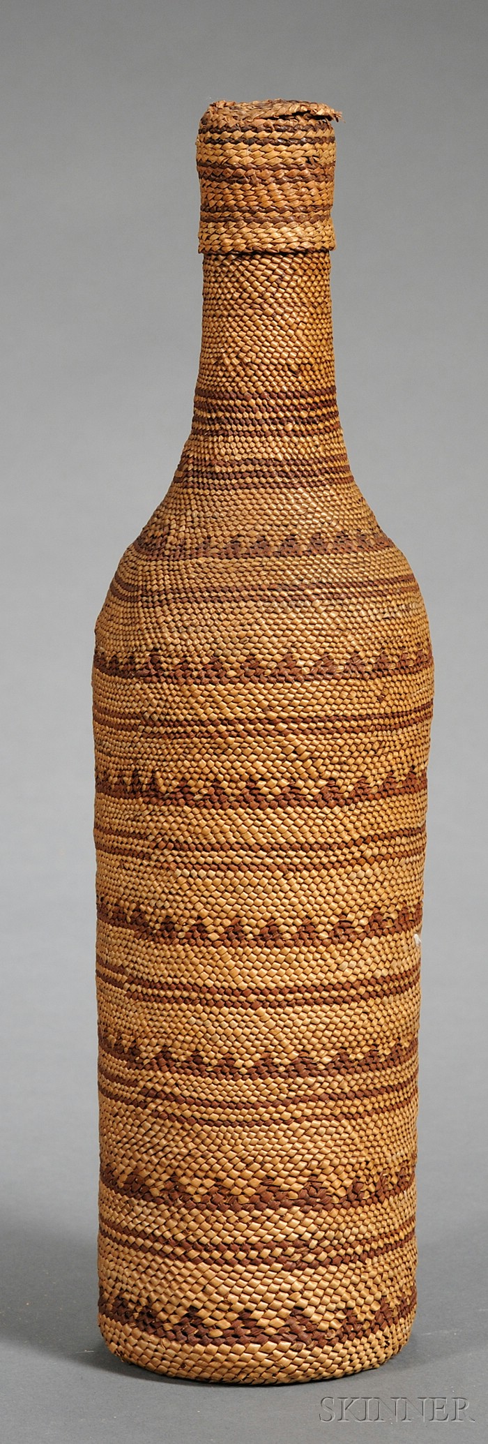 Appraisal: Northwest Twined Basketry Bottle Makah c completely covered bottle decorated