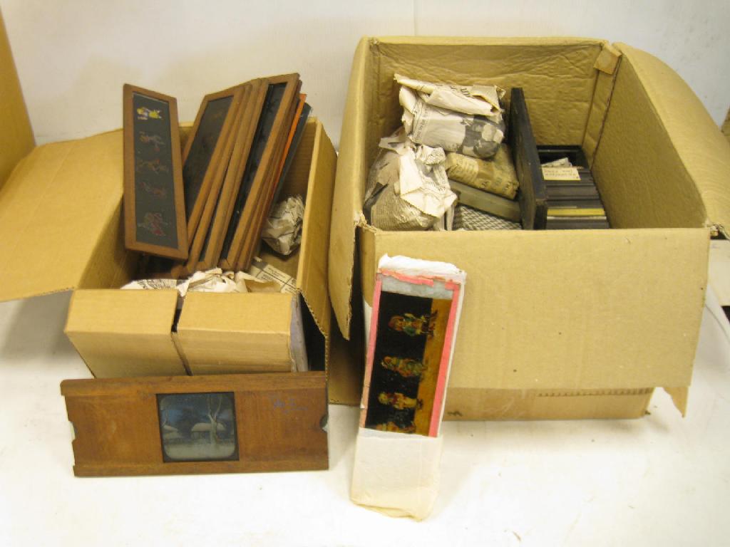 Appraisal: Two boxes coloured and photographic Lantern Slides