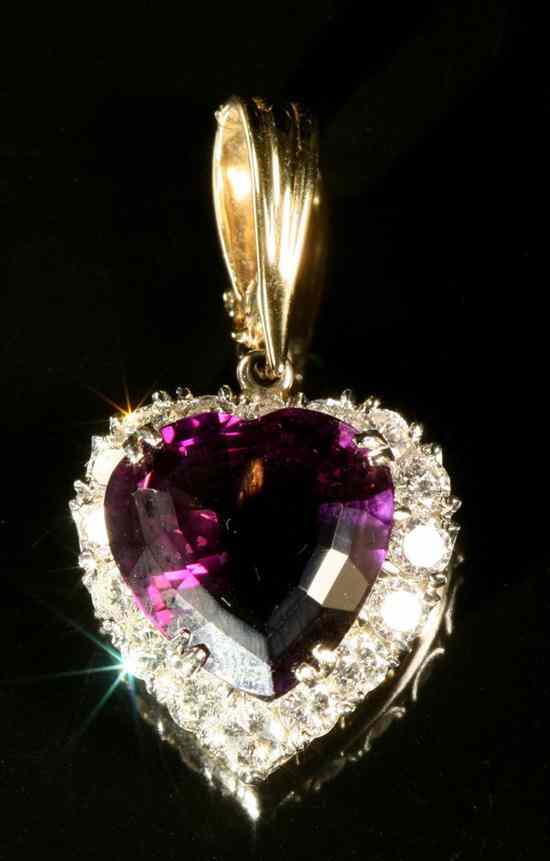 Appraisal: K YELLOW AND WHITE GOLD AMETHYST AND DIAMOND PENDANT Heart