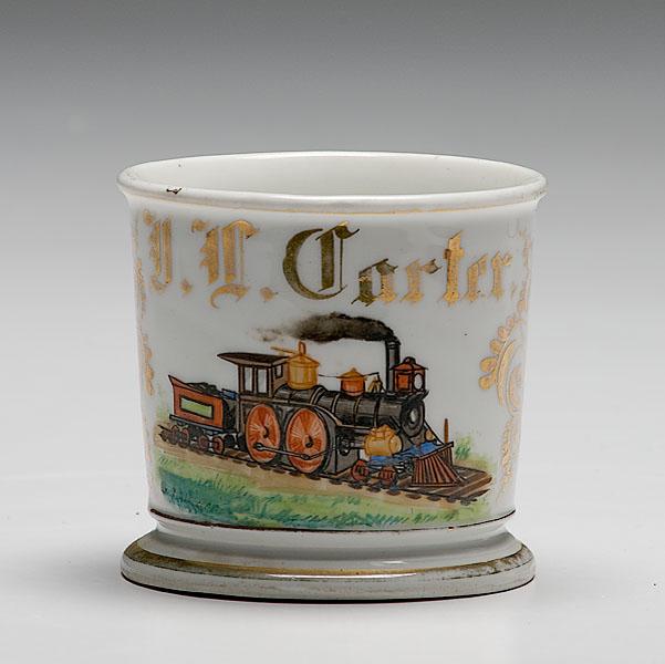 Appraisal: OCCUPATIONAL SHAVING MUG OF RAILROAD ENGINEER porcelain with polychrome painted