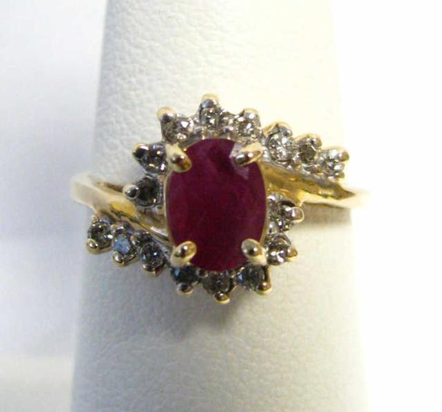 Appraisal: Lady's gold ruby and diamond ring with approximately ct ruby