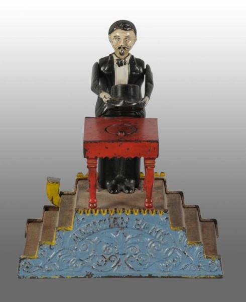 Appraisal: Cast Iron Magician Mechanical Bank Description Manufactured by J E