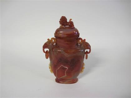 Appraisal: Chinese carved red agate covered vase th century