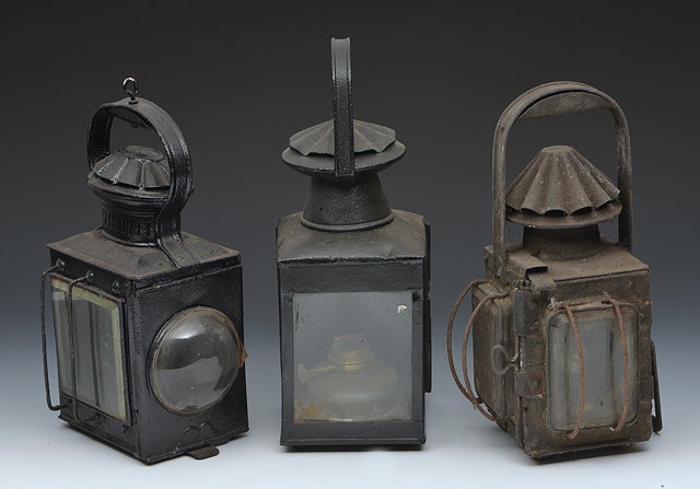 Appraisal: AN OLD BLACK PAINTED LANTERN with bulls eye lens high