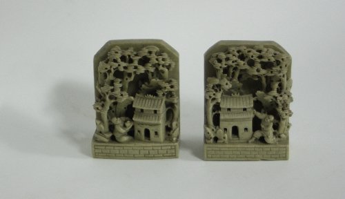 Appraisal: A pair of Cantonese soapstone book ends carved in high