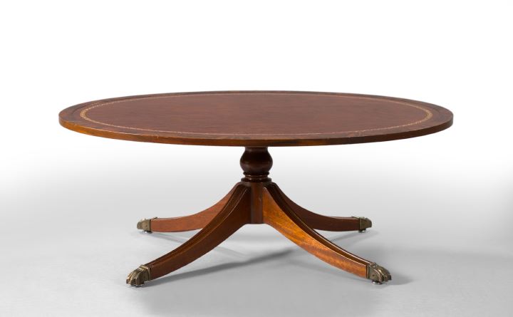 Appraisal: Regency-Style Mahogany Low Table the ovoid top with inset tooled