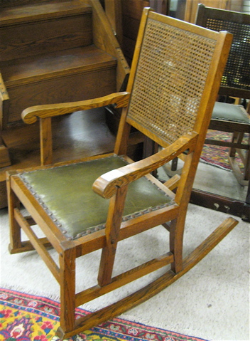 Appraisal: AN OAK ROCKING CHAIR Heywood Brothers and Wakefield Company Chicago