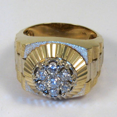 Appraisal: DIAMOND AND FOURTEEN KARAT GOLD RING set with seven round-cut