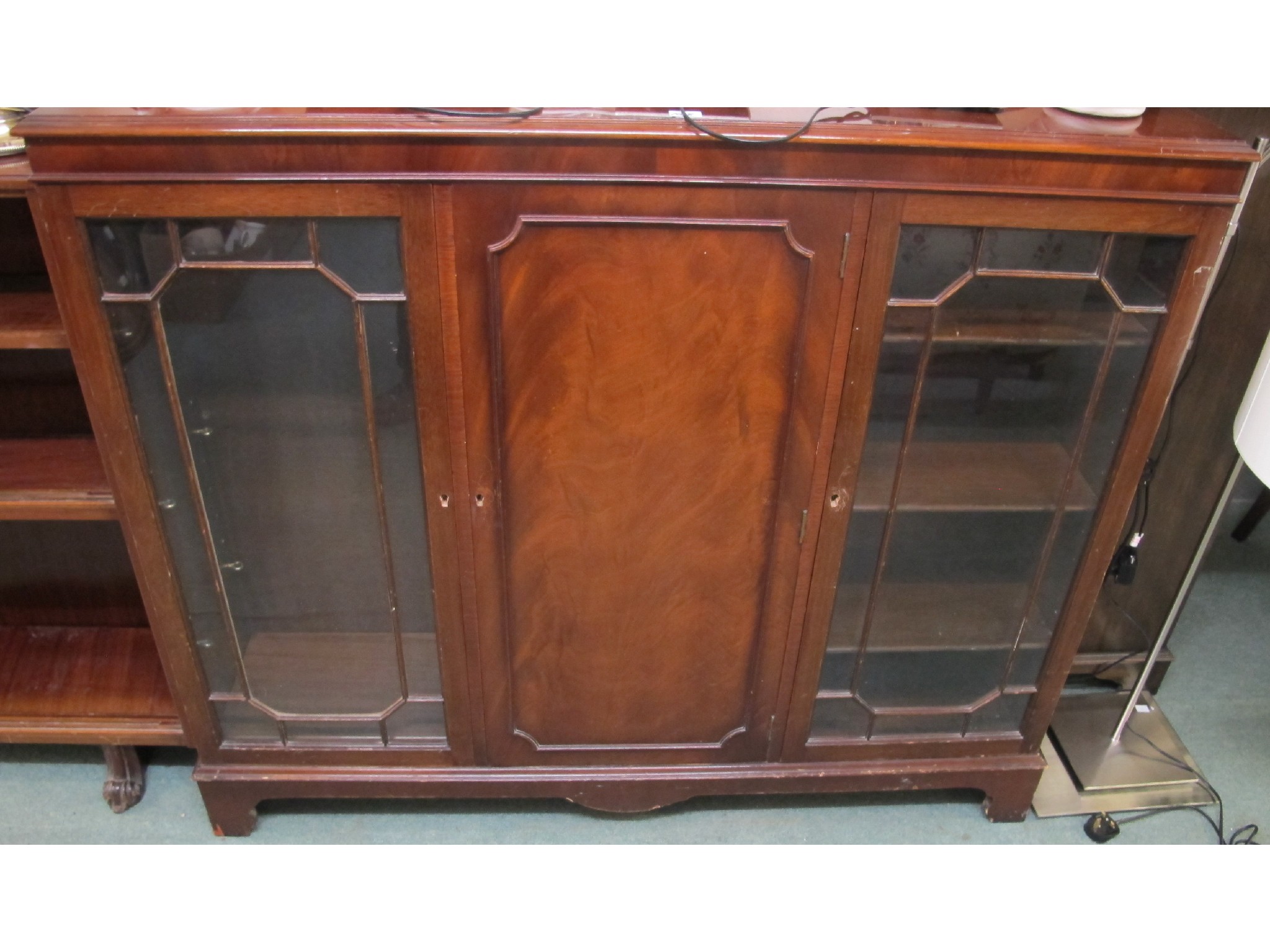 Appraisal: A mahogany display cabinet