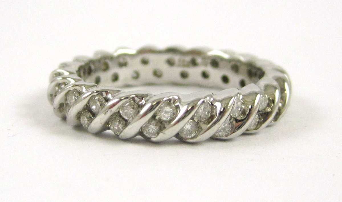 Appraisal: LAURA RAMSEY DIAMOND ETERNITY RING k white gold set with