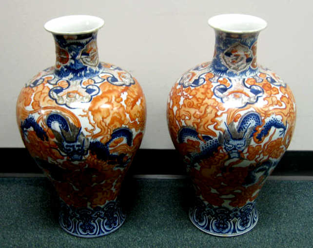 Appraisal: FINE PAIR OF JAPANESE PORCELAIN VASES Baluster painted overglaze cobalt