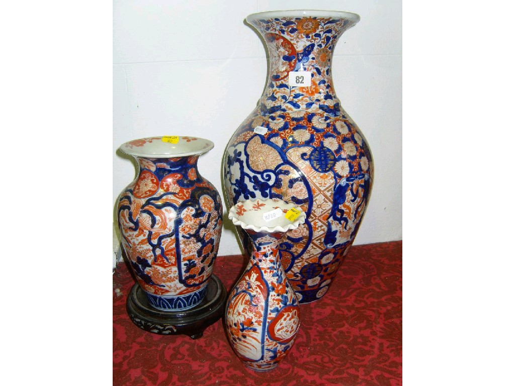 Appraisal: A pair of th century Mintons majolica -handled vases with