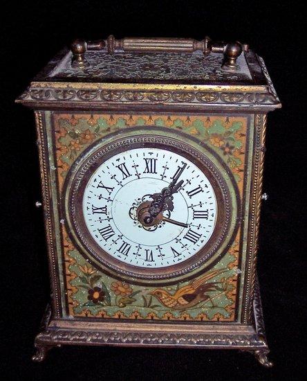 Appraisal: A Continental clock fitted an alarm in an Oriental style