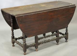 Appraisal: Gateleg drop leaf table bottom of each leaf separated ht