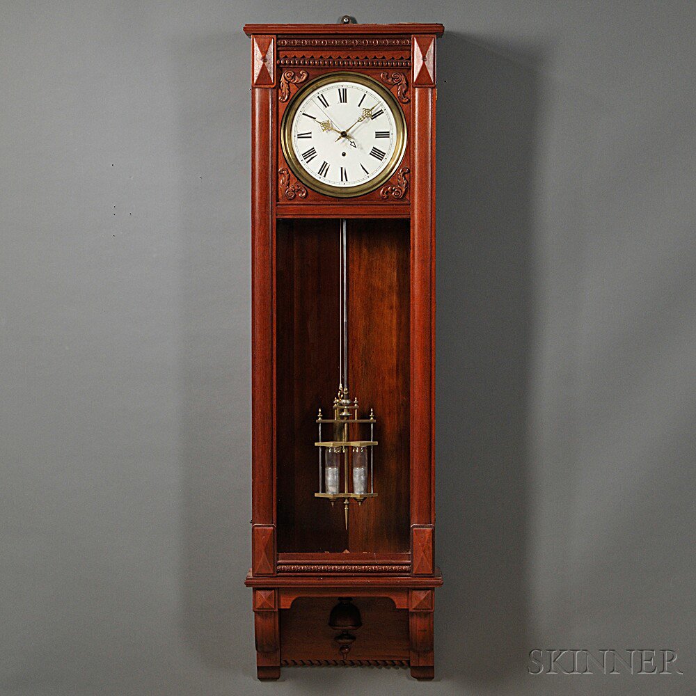 Appraisal: Waterbury Mahogany Wall Regulator Waterbury Connecticut c mahogany case with