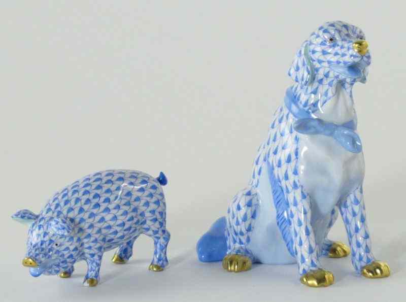 Appraisal: Herend Pig and Dog Figurineeach hand painted blue fishnet motif