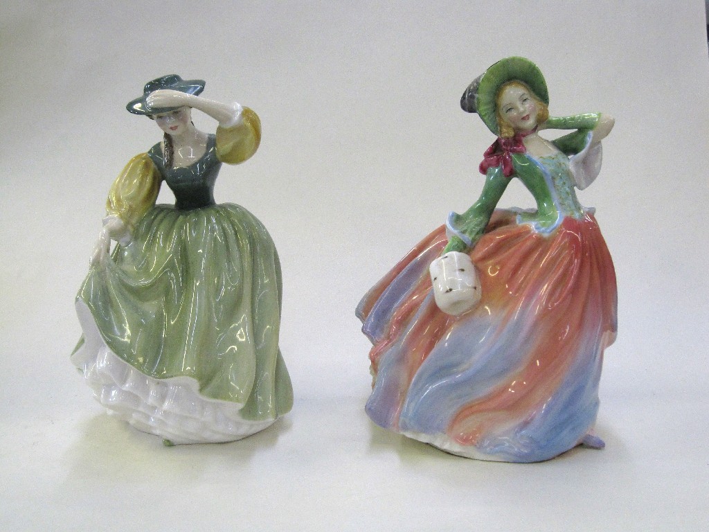 Appraisal: Two Royal Doulton figures 'Autumn Breezes' HN and 'Buttercup' HN