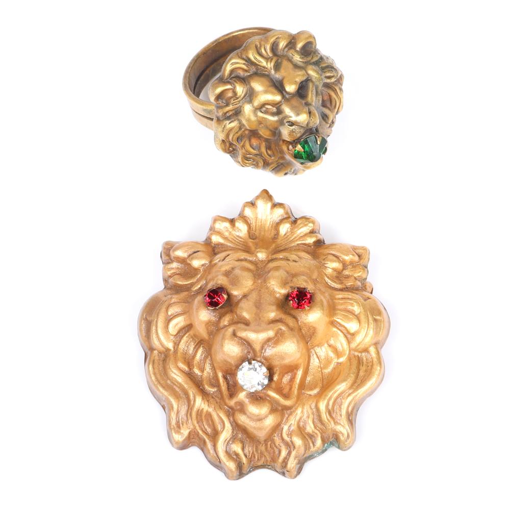 Appraisal: JOSEFF OF HOLLYWOOD BRASS REPOUSSE LION BROOCH WITH RUBY RHINESTONE