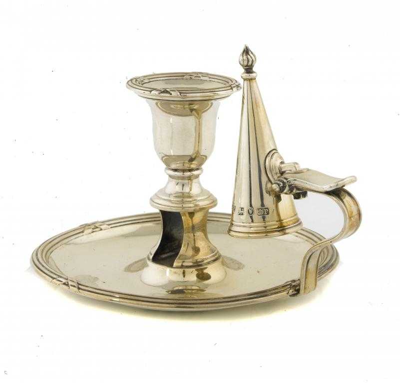 Appraisal: A WILLIAM IV CHAMBERSTICK with bell shaped sconce nozzle and