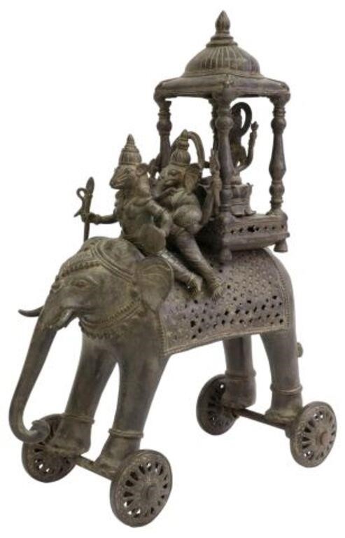 Appraisal: Large patinated bronze temple toy India th c three Hindu