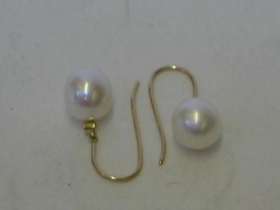 Appraisal: A PAIR OF CULTURED PEARL EARRINGS the white pearl drops