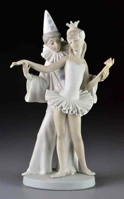 Appraisal: Lladro Porcelain Figurines ''Masquerade''Depicting a male dressed as Pierrot and