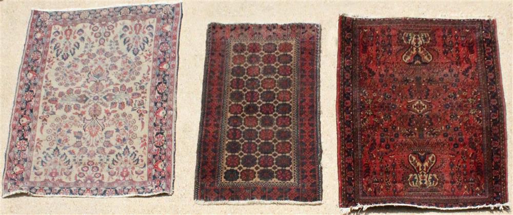 Appraisal: TWO PERSIAN FLORAL DESIGN RUGS TOGETHER WITH A TRIBAL BALOCHISTAN