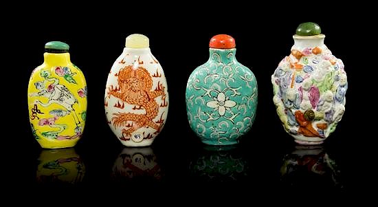 Appraisal: A Group of Four Porcelain Snuff Bottles Height of tallest