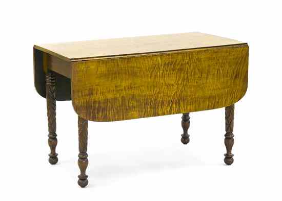 Appraisal: An American Classical Tiger Maple Drop-Leaf Table having a rectangular