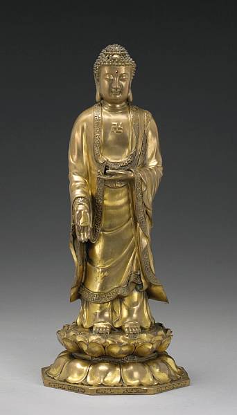 Appraisal: A gilt bronze figure of a Buddha Taisho Showa Period