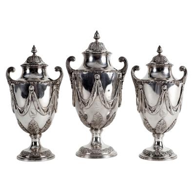 Appraisal: A garniture of three George III silver sugar vases Daniel