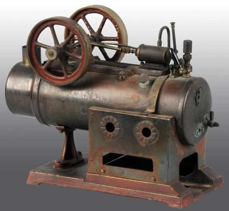 Appraisal: German Overtype Steam Engine Description Double flywheels oscillating cylinder and