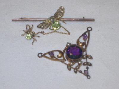 Appraisal: A PERIDOT BROOCH modelled as a fly seated on a